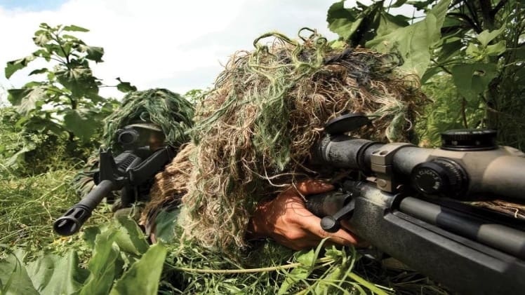 Masters Of Camouflage: Unveiling The Intricacies Of Special Operatives In Ghillie Suits